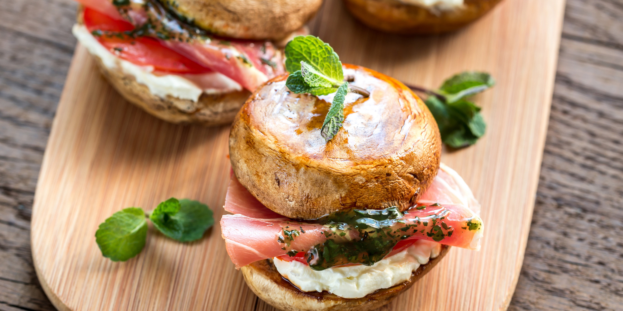 Mushroom Burgers with Prosciutto, Goat Cheese and Mint Sauce at foodious.com