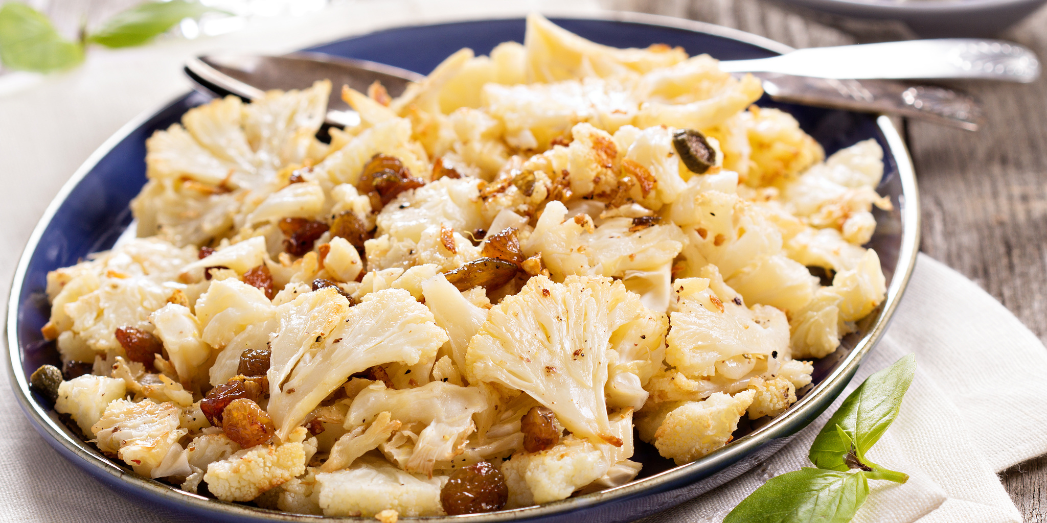Baked Cauliflower with Capers and Raisins at foodious.com