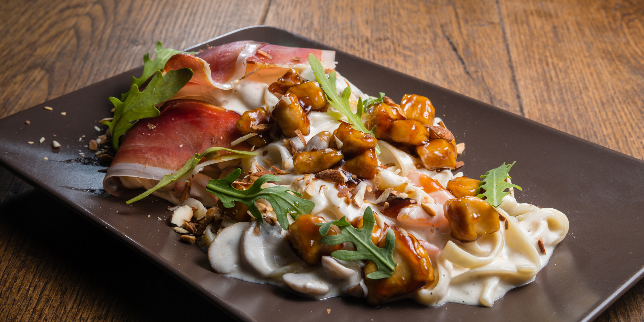 Alfredo with Prosciutto, Almonds, and Balsamic Honey Chicken at foodious.com