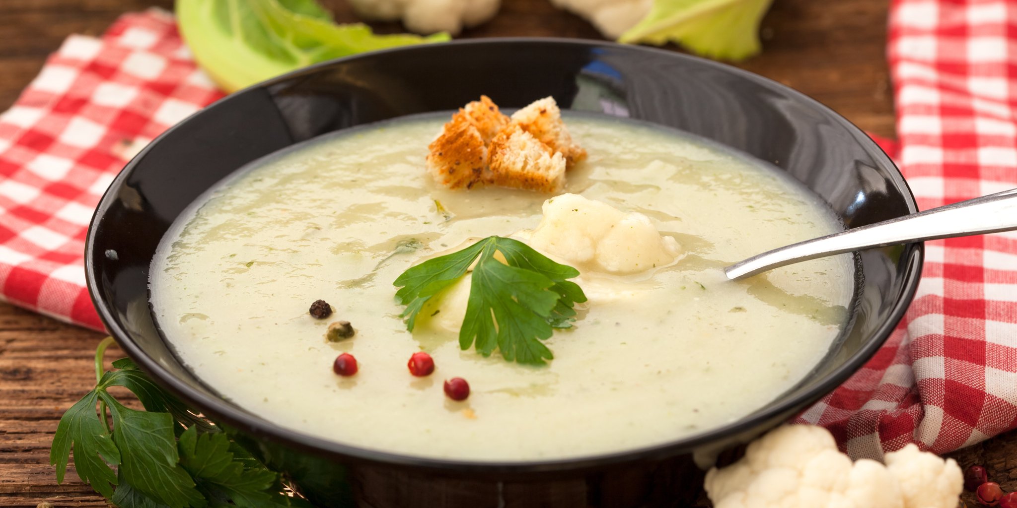 Creamy Roasted Cauliflower Soup at foodious.com