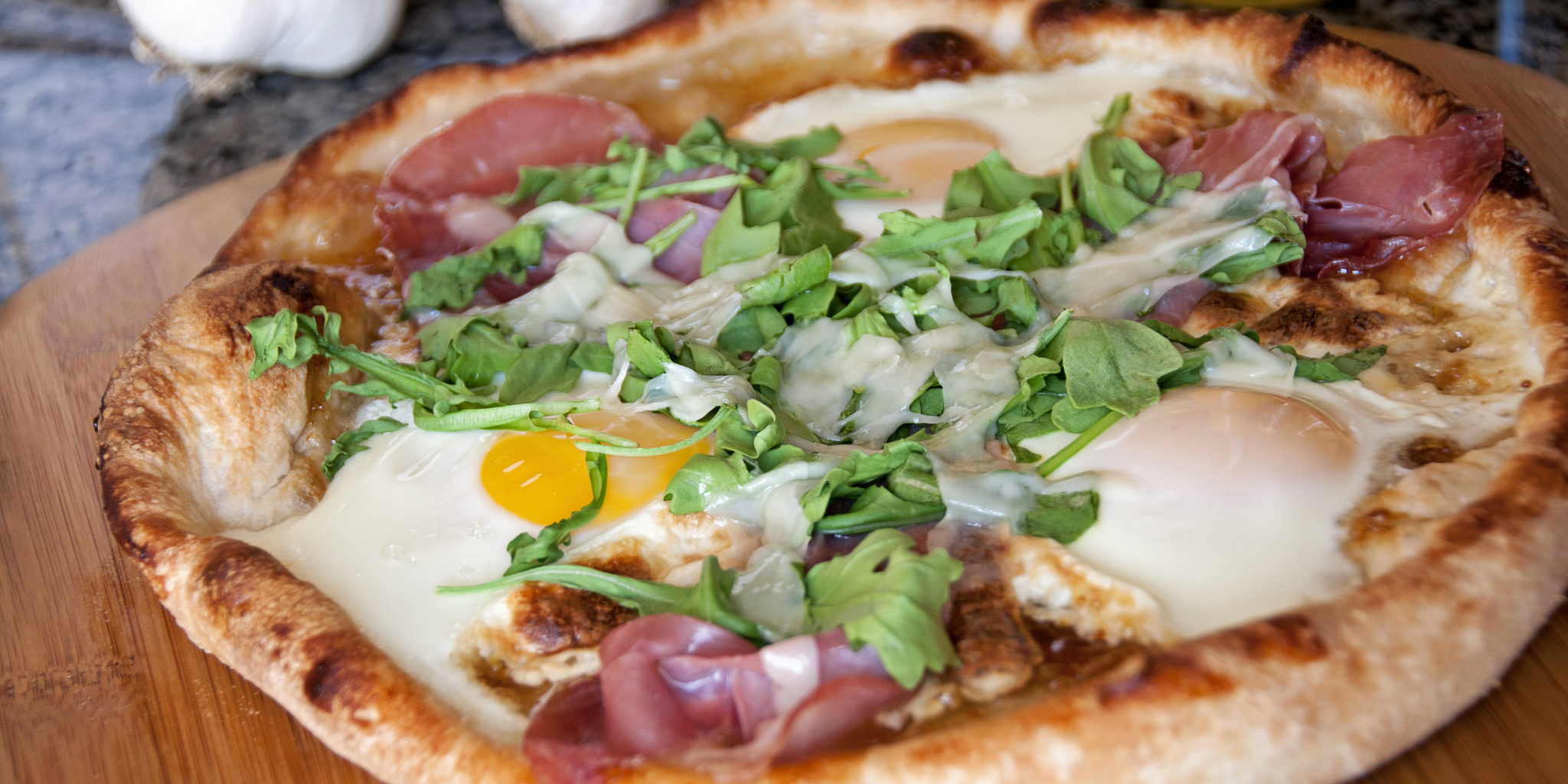Pizza with Egg, Arugula, Prosciutto at foodious.com