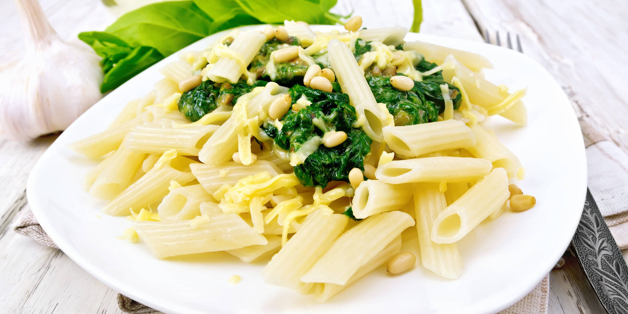 Parmesan Penne with Wilted Spinach and Pine Nuts at foodious.com