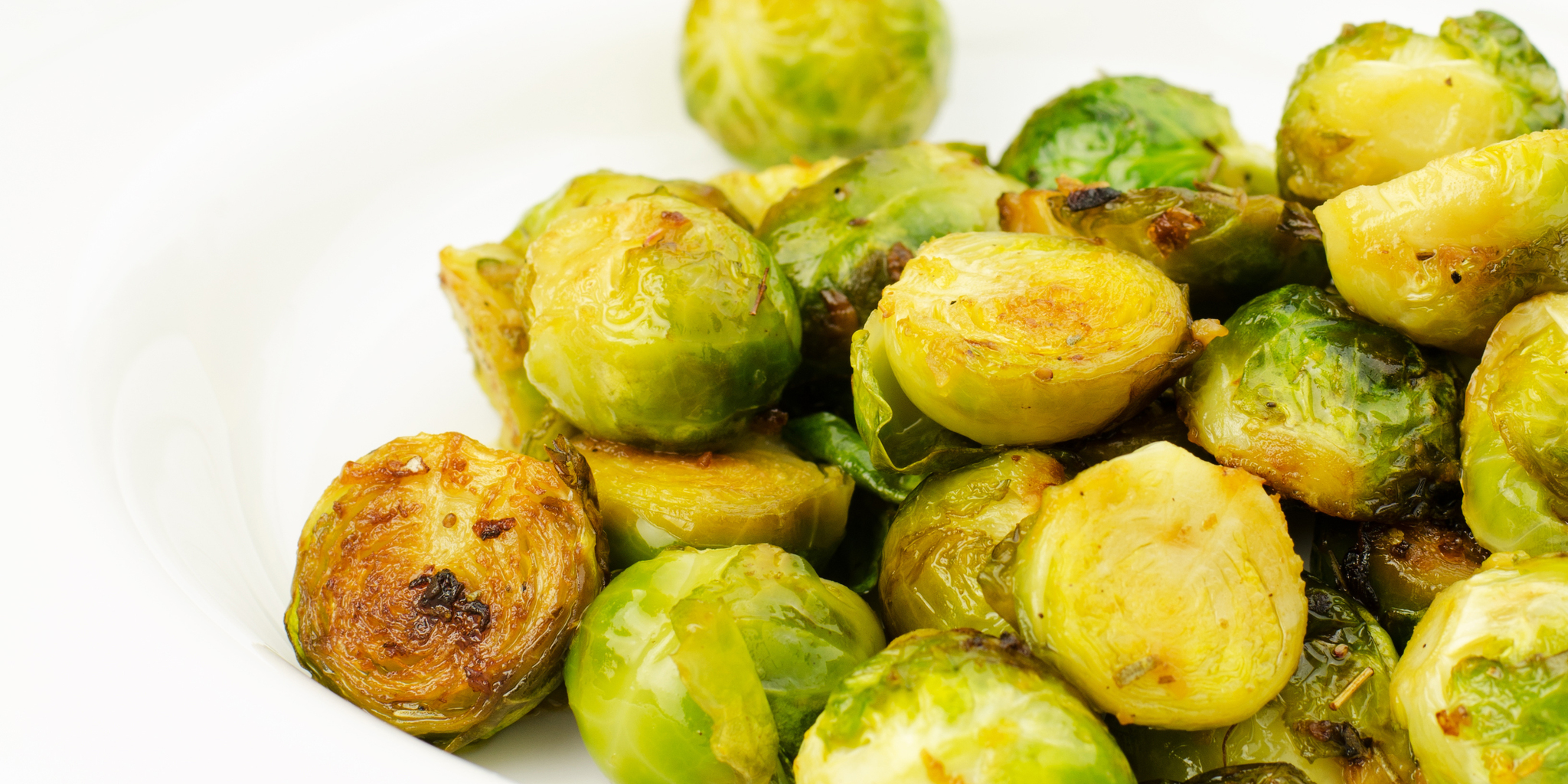 Garlic Roasted Brussels Sprouts with Lemon Mustard Parsley Dressing at foodious.com