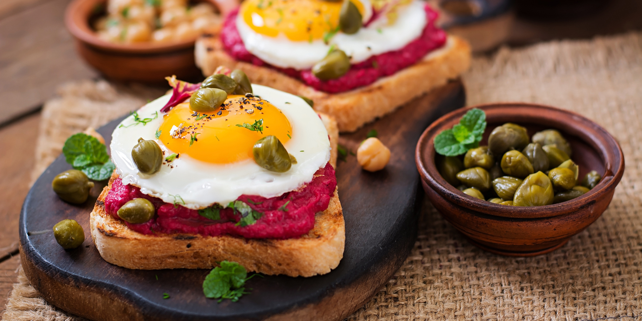 Beet Hummus, Caper, Fried Egg Sandwich at foodious.com