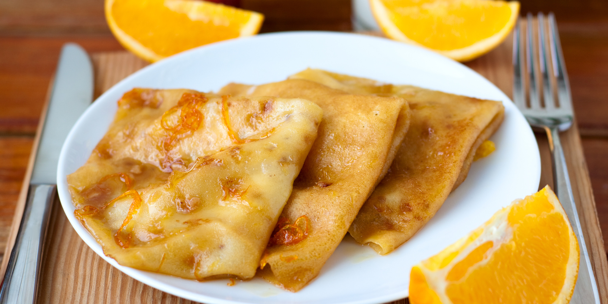 Ginger Crepes with Mandarin Orange Syrup at foodious.com