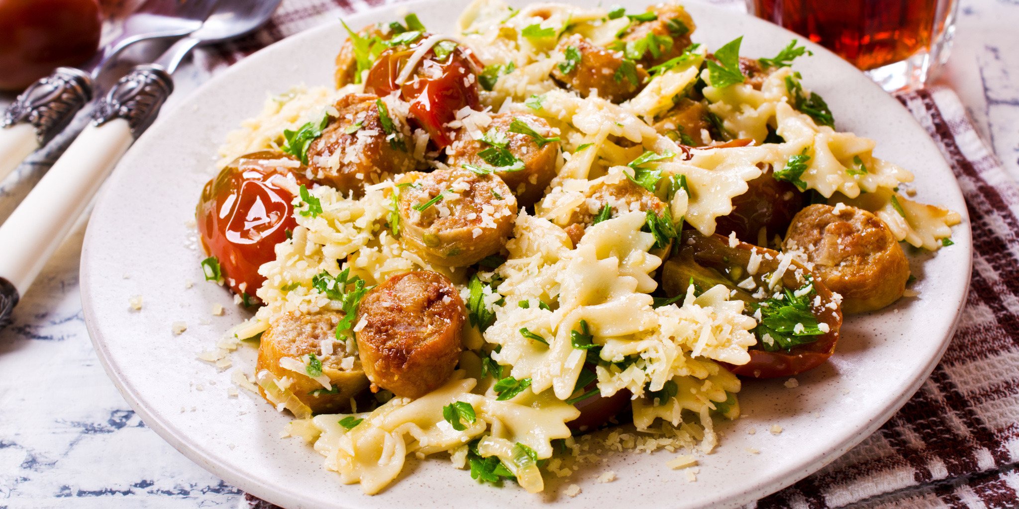 Farfalle with Sausage and Wilted Tomatoes at foodious.com