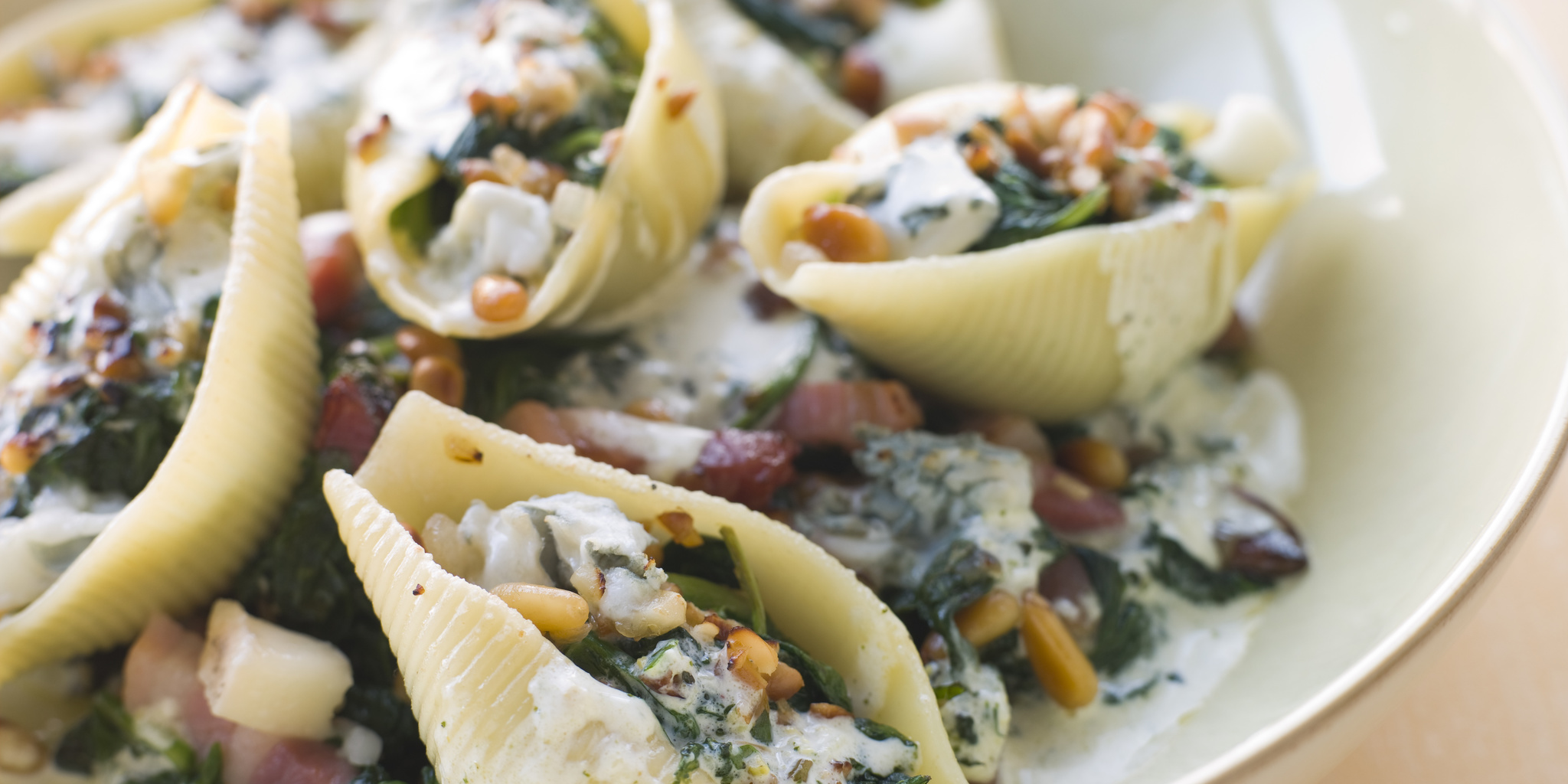Stuffed Shells with Spinach Pancetta and Pine Nuts at foodious.com