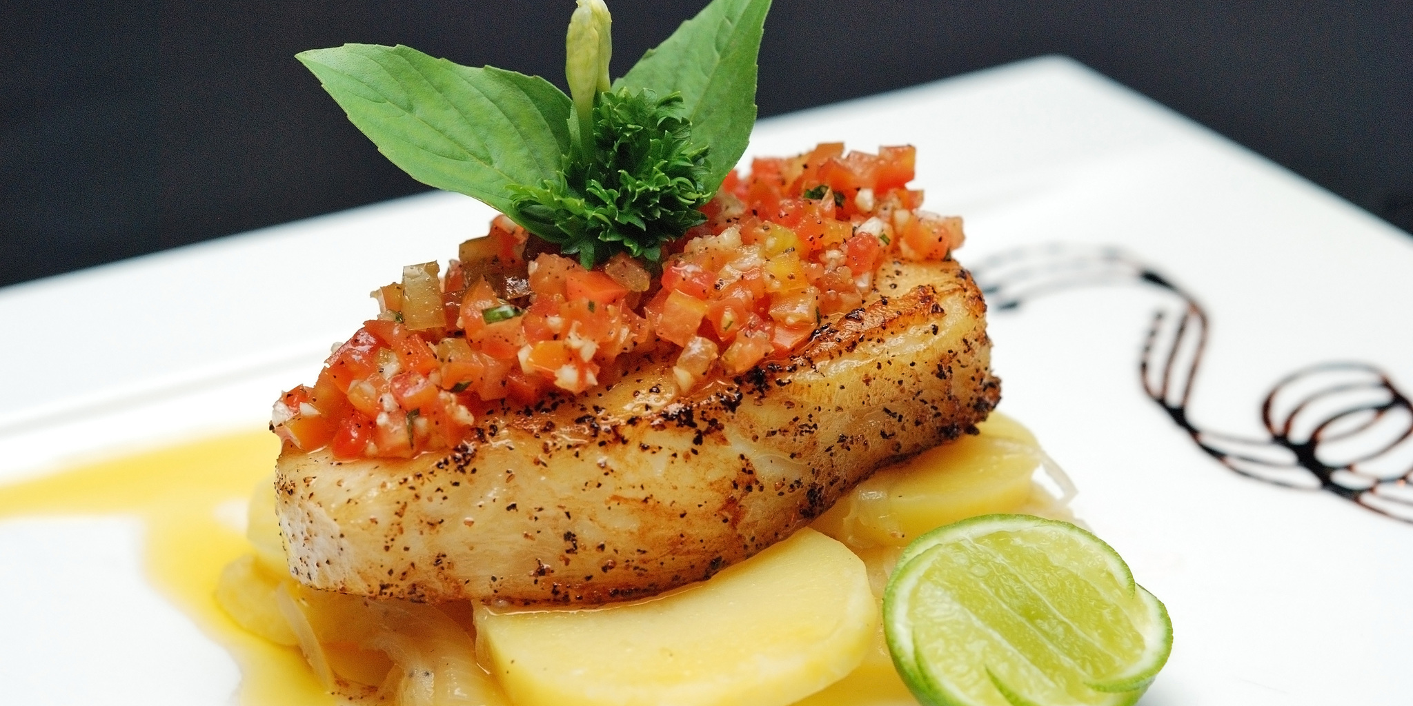 Pan Seared Sea Bass with Salsa over Potatoes at foodious.com