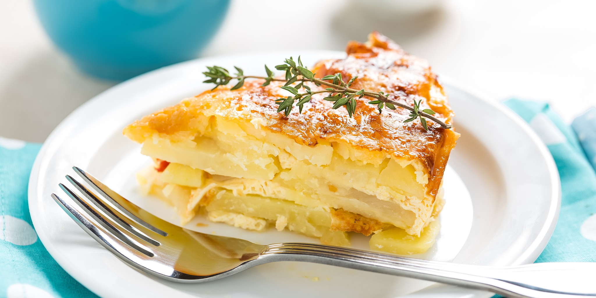 Garlic Parmesan Potato Gratin at foodious.com