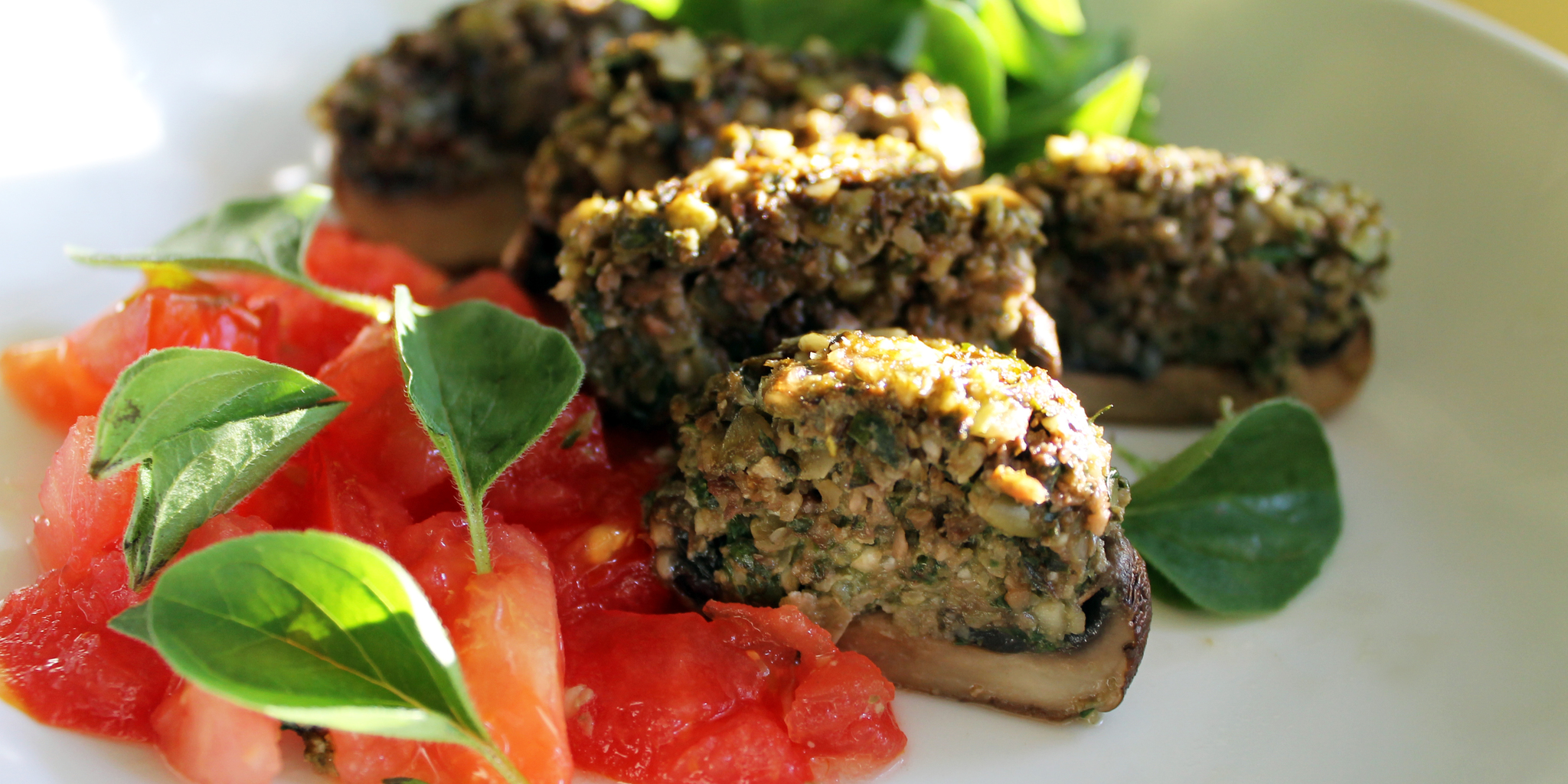 Pumpkin Seed Pesto Stuffed Mushrooms at foodious.com